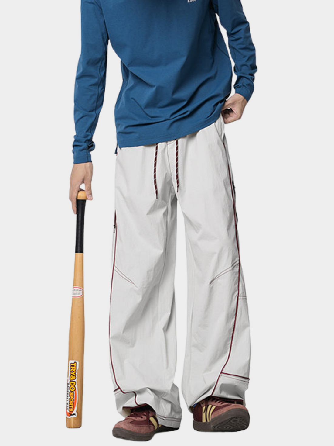 STRIPED CURVED CUT PANTS