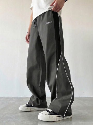 ARC FLOW PIPING TRACKPANTS